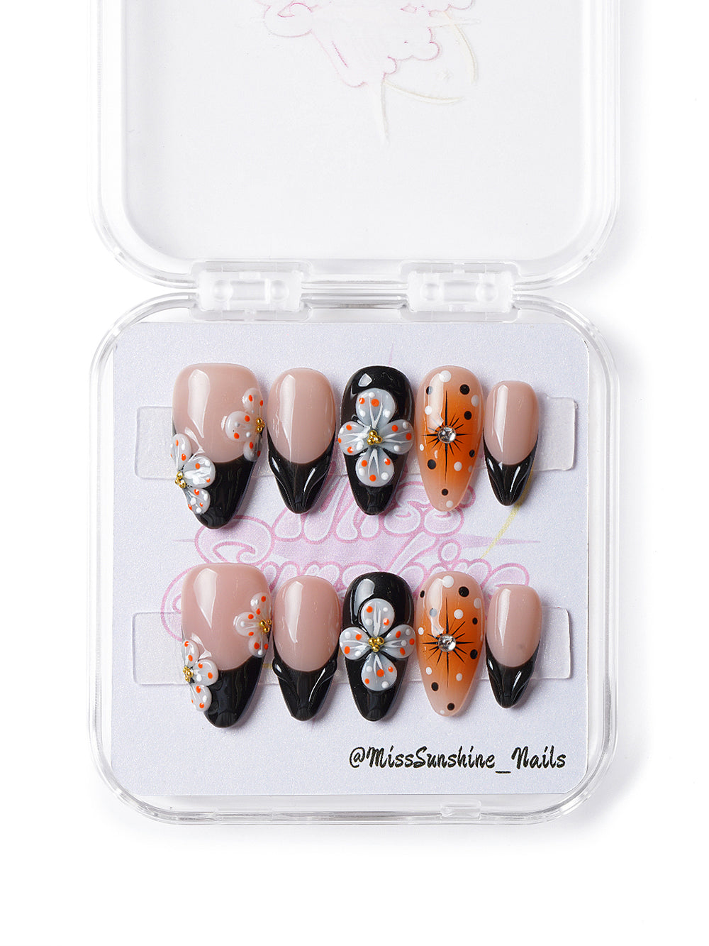 Handmade floral nails with orange accents, polka dots, and glossy gel finish