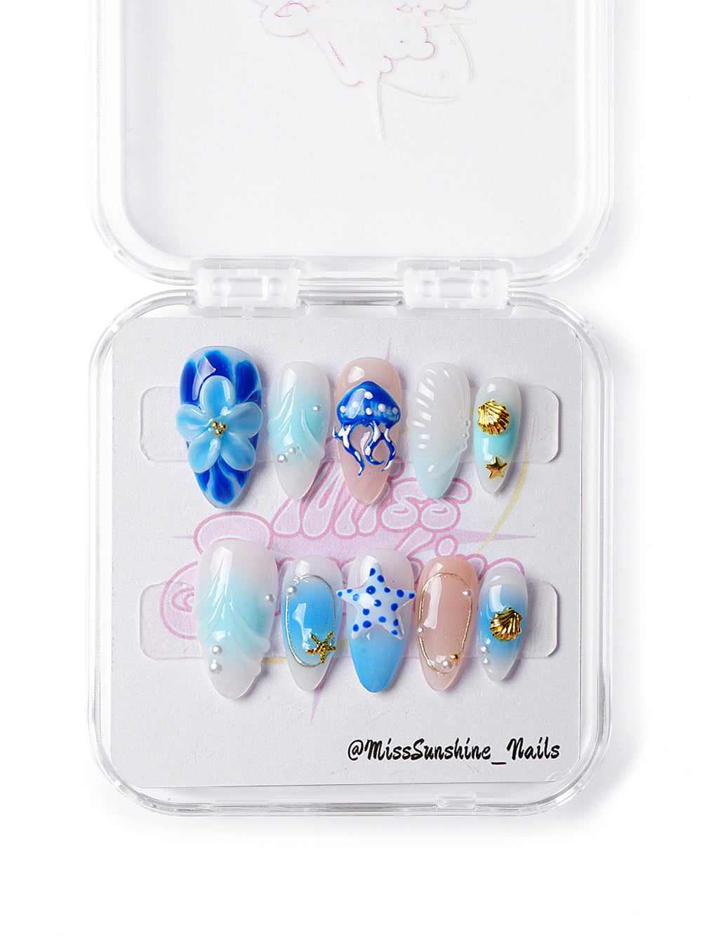 Handmade under-the-sea press-on nails with pearl accents and whimsical marine details