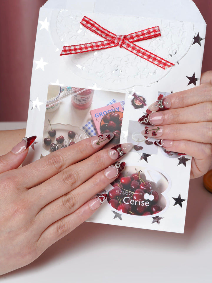 Romantic cherry kiss nails with glossy tips