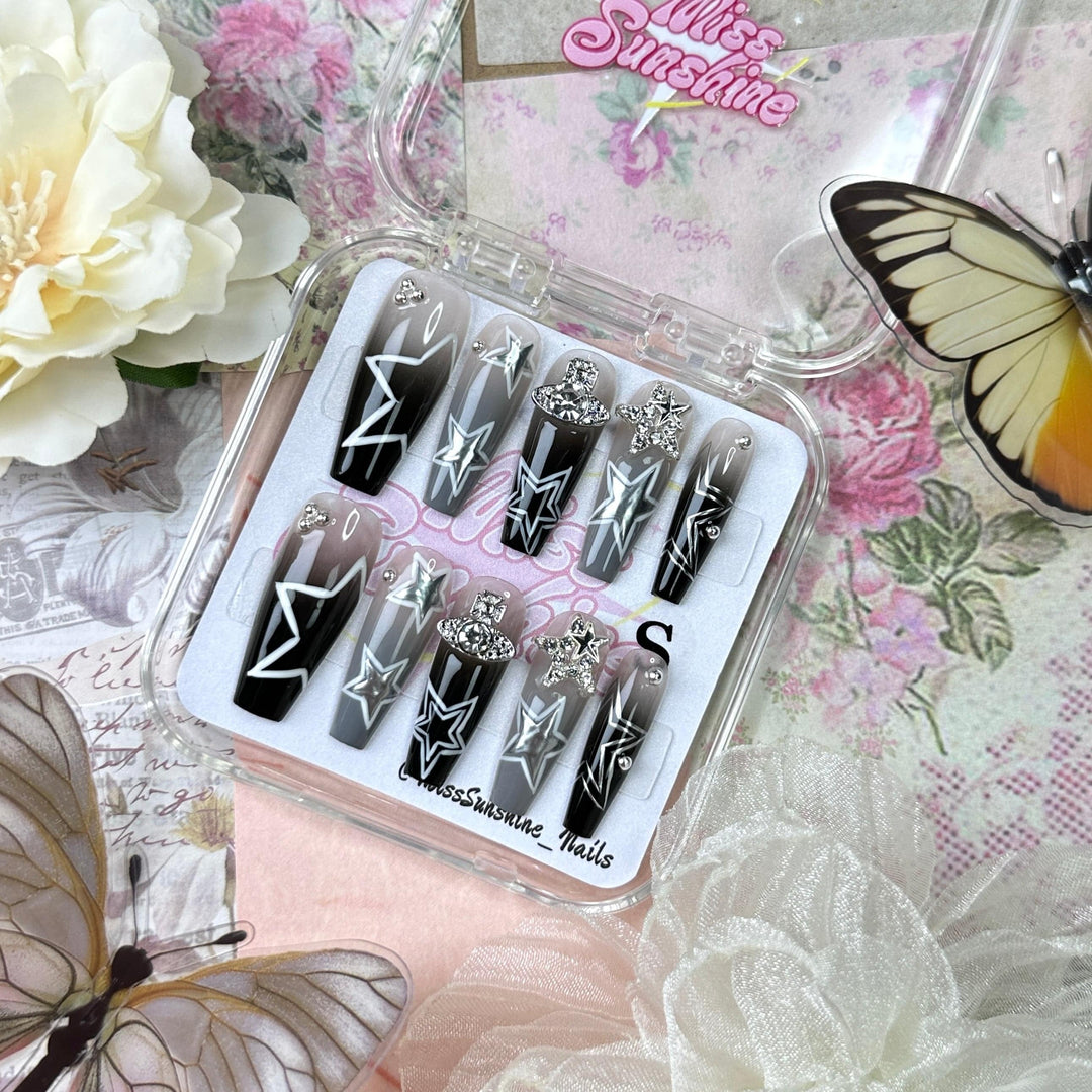 Cool Stars long coffin nails with white designs