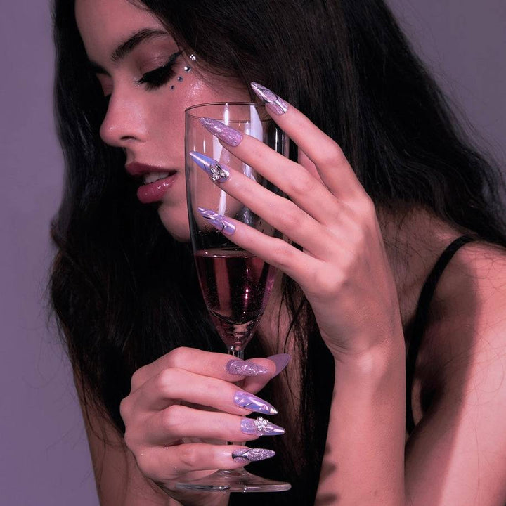Lavender chrome nails with 3D butterflies