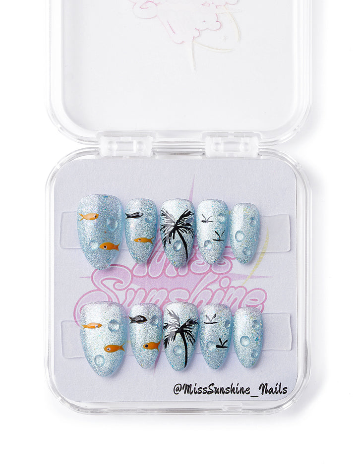 Tropical beach nails in extra short almond