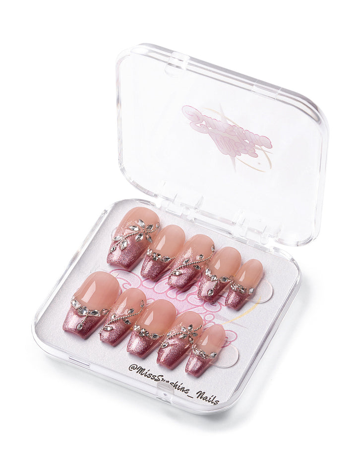 Medium-long coffin nails with rose tips and rhinestones