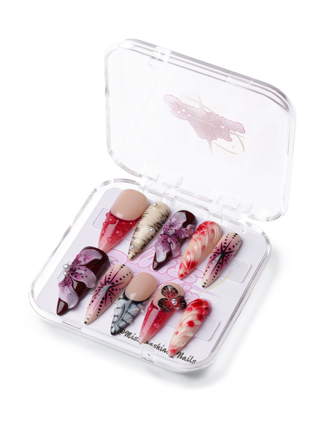 Jungle Flower long stiletto press-on nails with 3D flowers, animal print accents, and bold red-black floral designs.