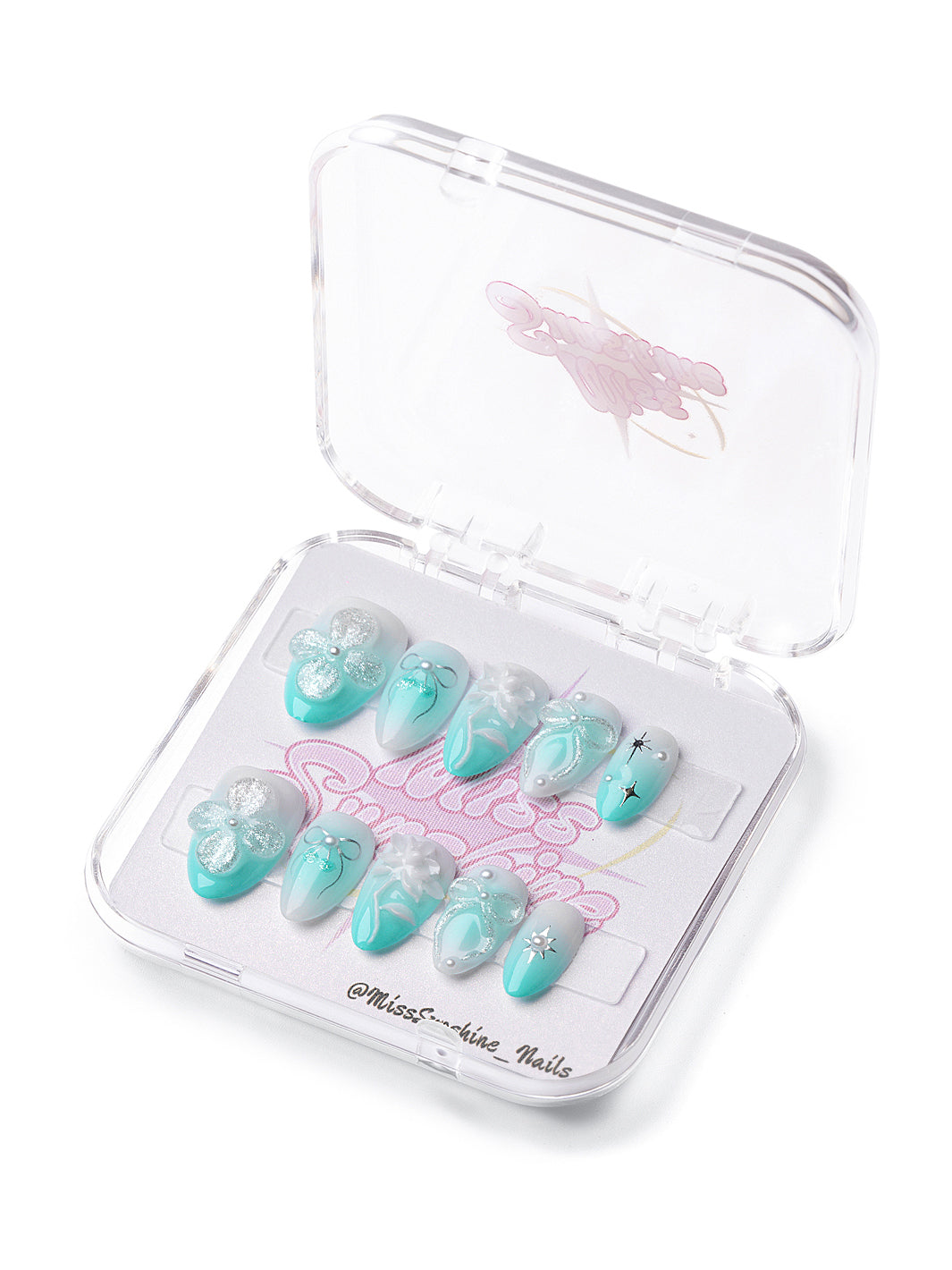 Mint Lotus extra short almond press-on nails with jelly green base, 3D floral accents, shimmer, and pearls.