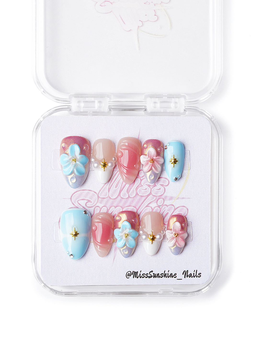 Handmade extra short almond nails with soft pastel swirls, 3D blossoms, pearl charms, and gold starburst details