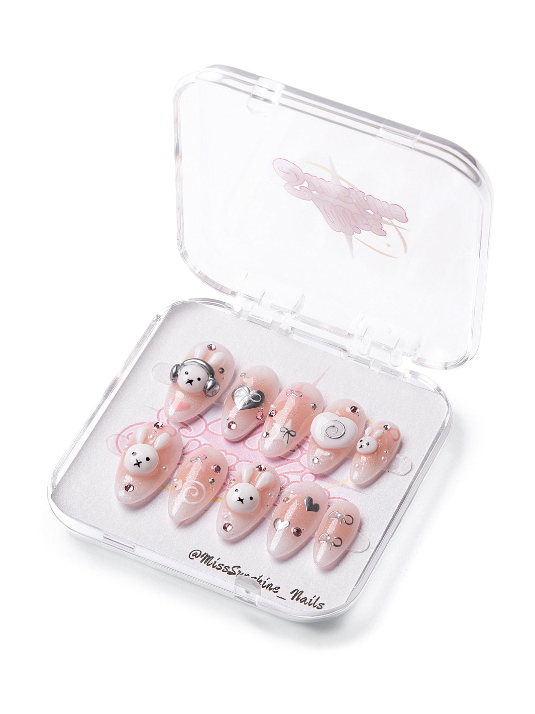 Pink nails with bunny and heart accents