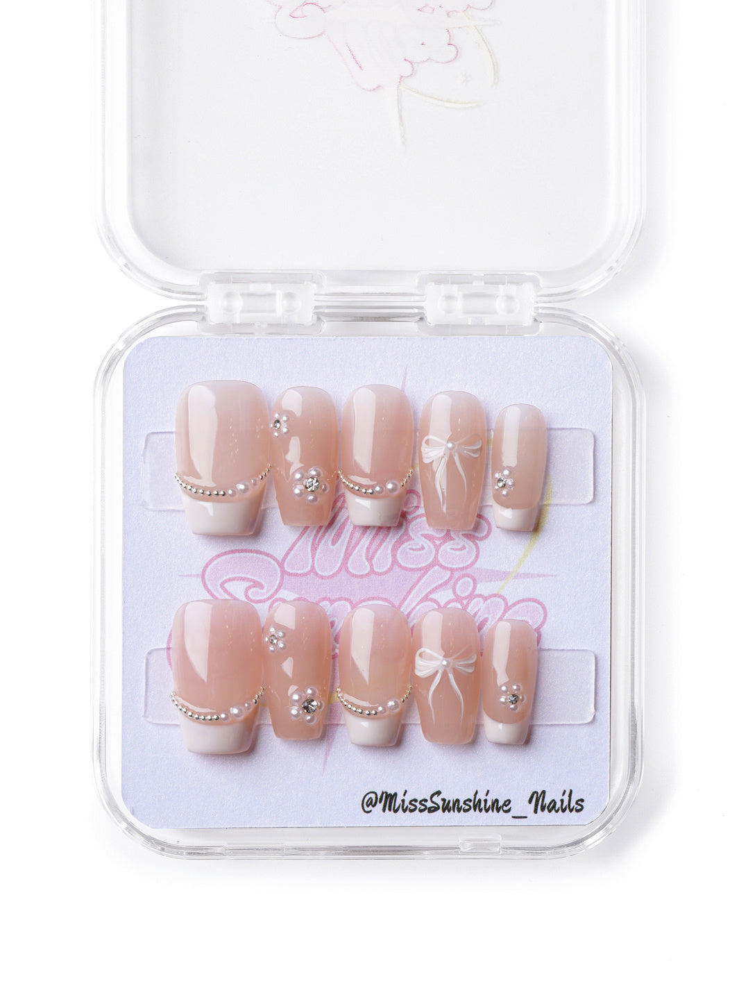 Nude and pearl-accented short coffin press-on nails with a minimalist yet sophisticated design.