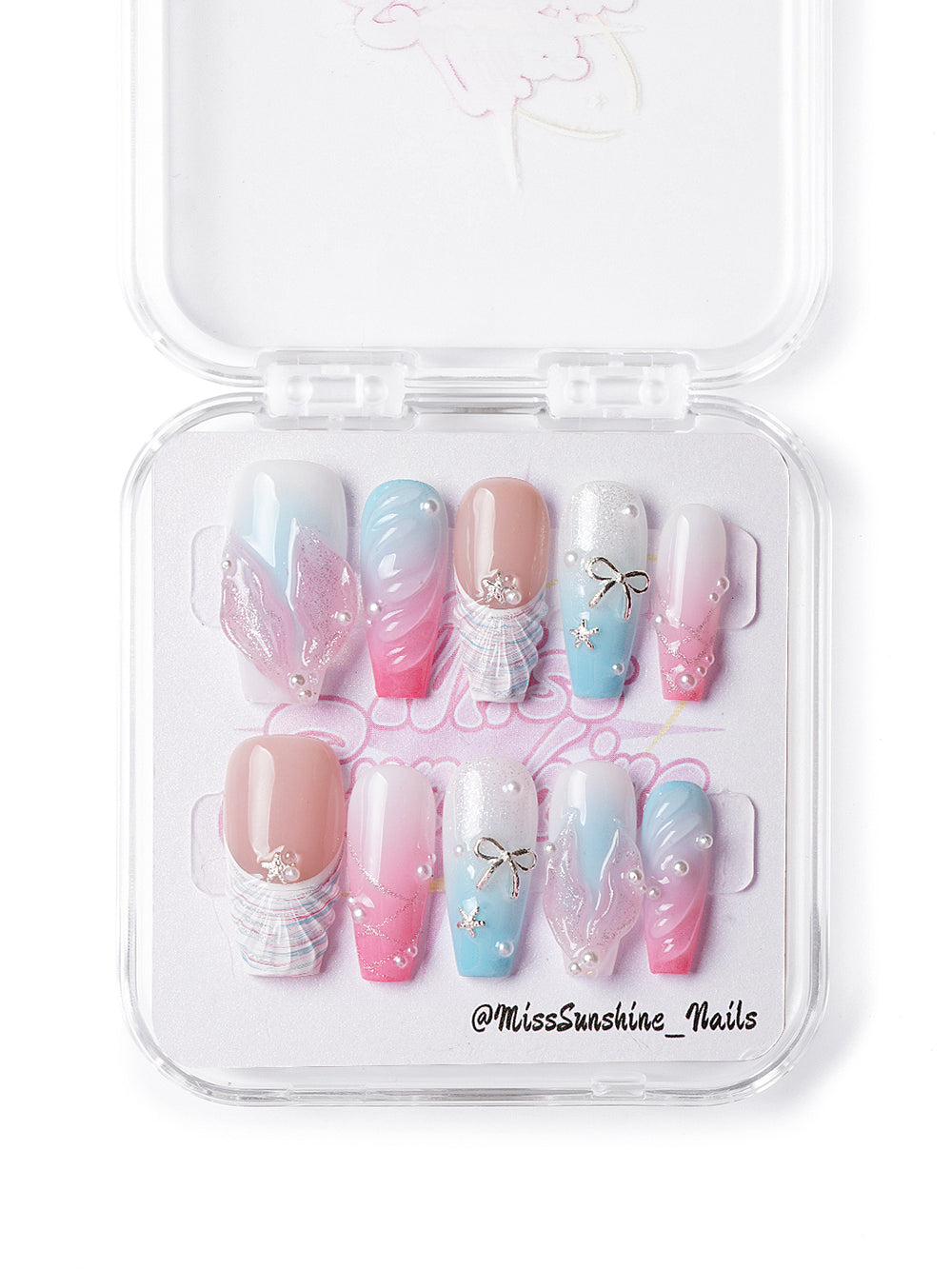 Handmade mermaid-inspired nails featuring 3D ocean details in pink and blue tones