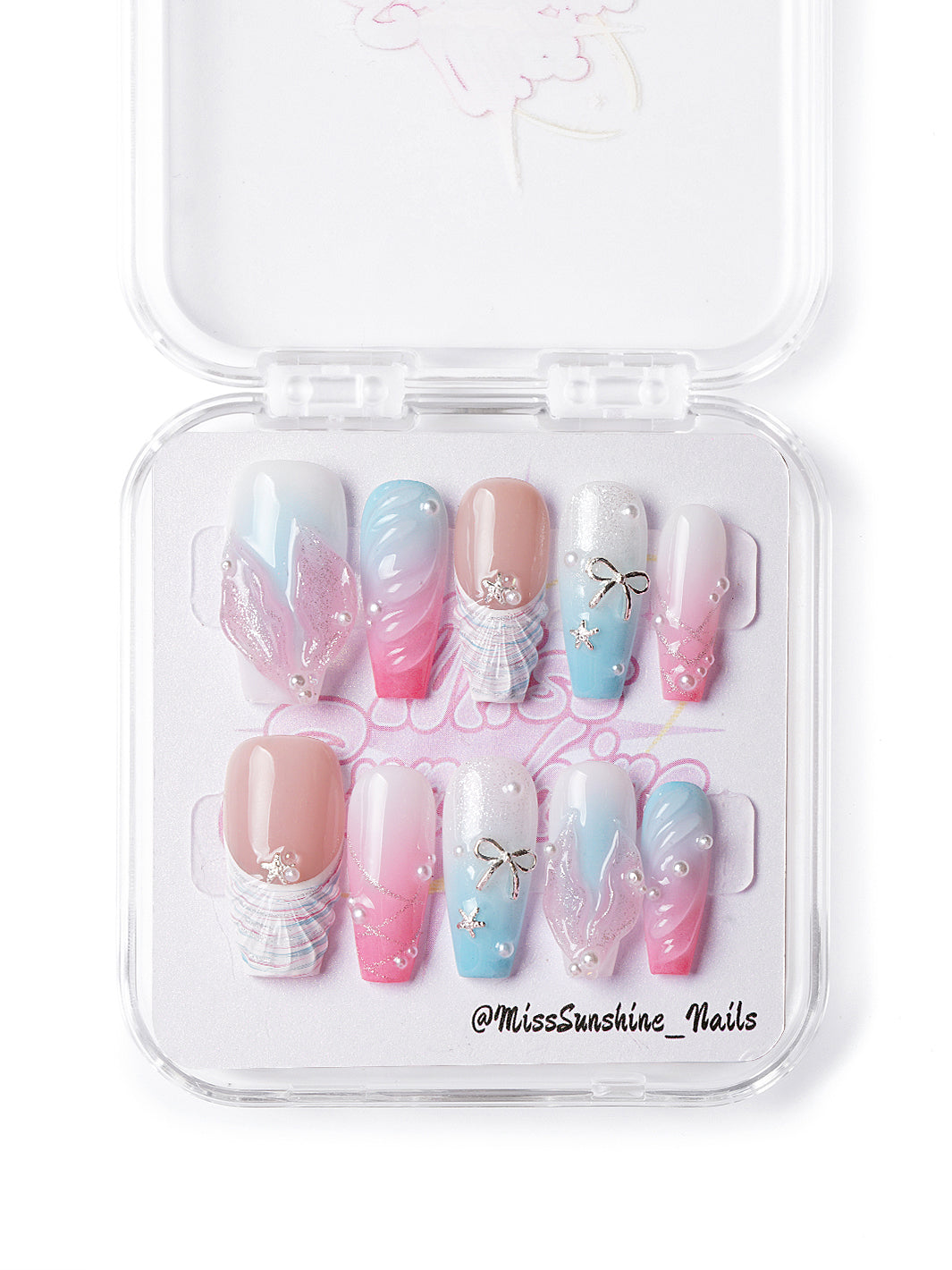 Handmade mermaid-inspired nails featuring 3D ocean details in pink and blue tones