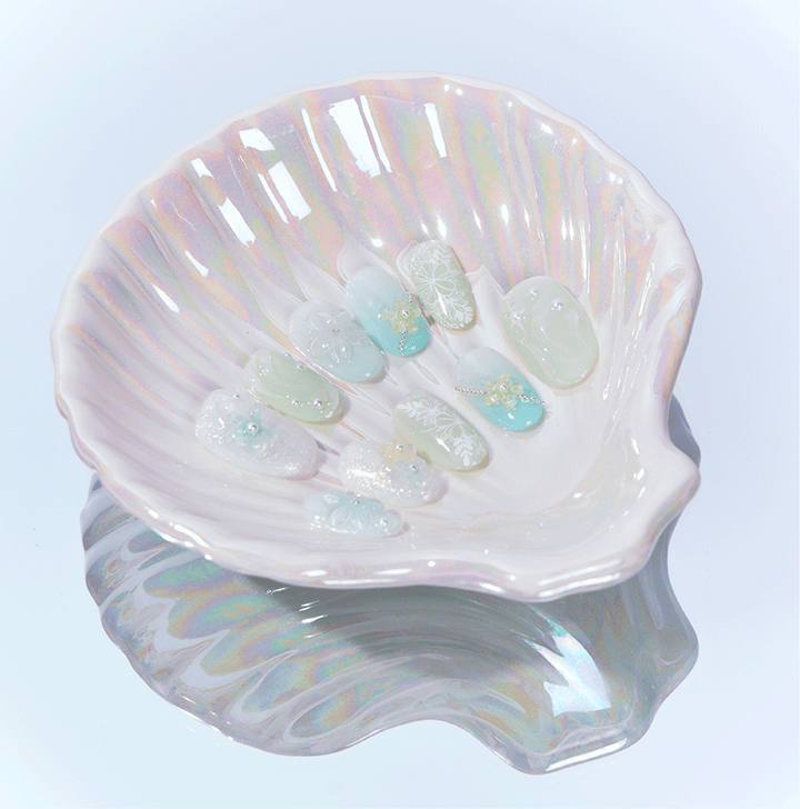Pastel oval nails with pearls