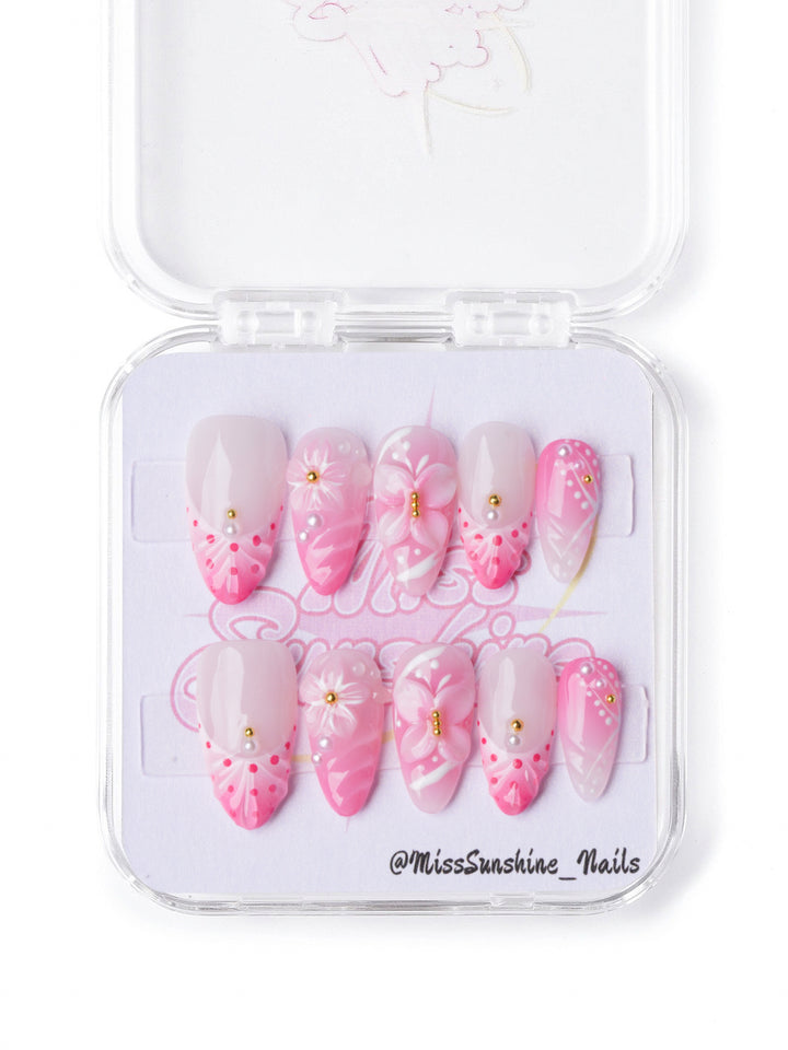 Short almond nails with butterfly accents