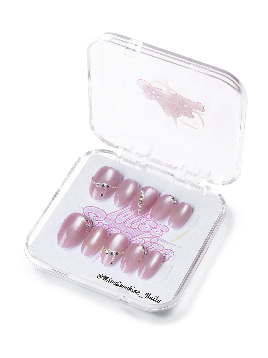 Extra short almond nails in blush shimmer with silver chains and metallic gem accents