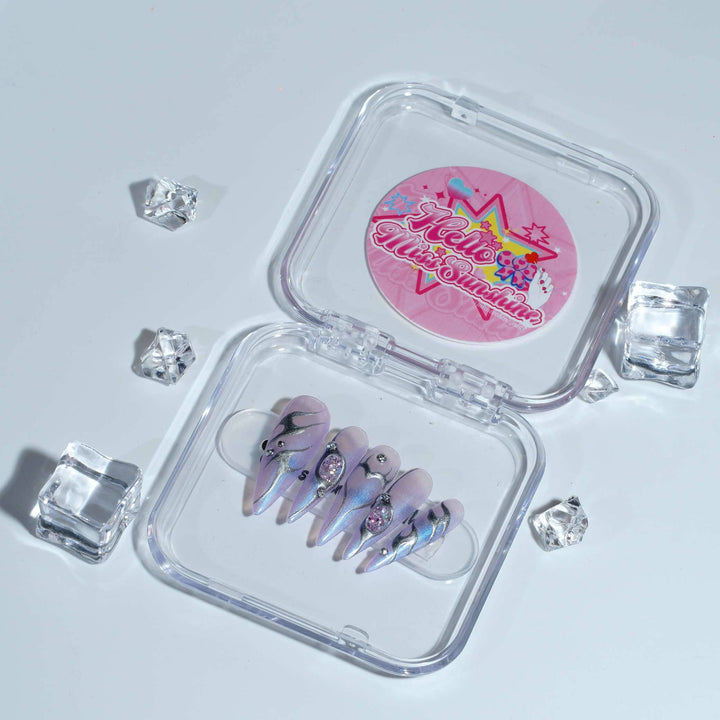 Cosmic inspired nails with mystical glam look