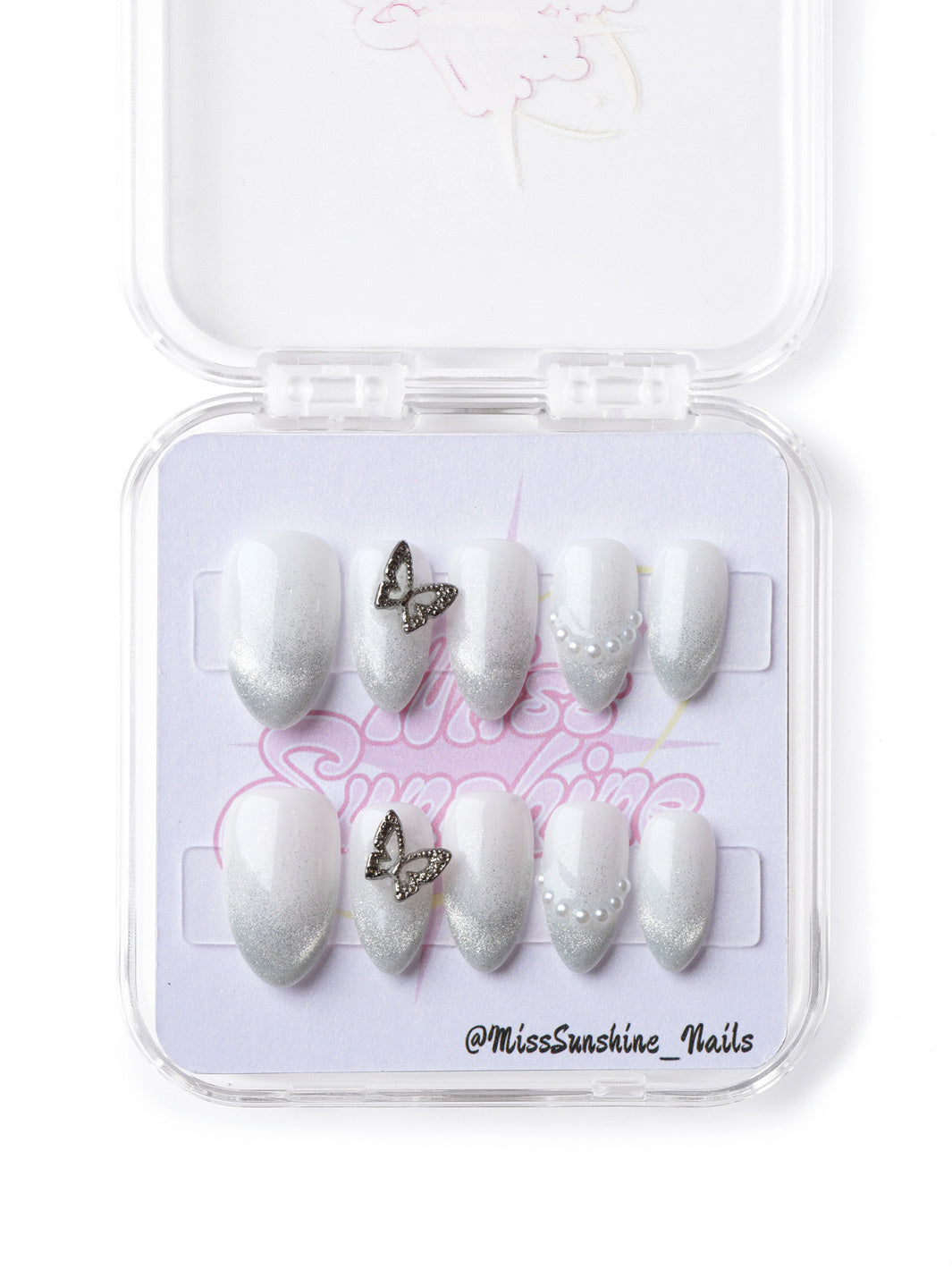 Delicate white-to-silver ombré press-on nails with pearls and a butterfly accent, perfect for a dreamy, graceful manicure.