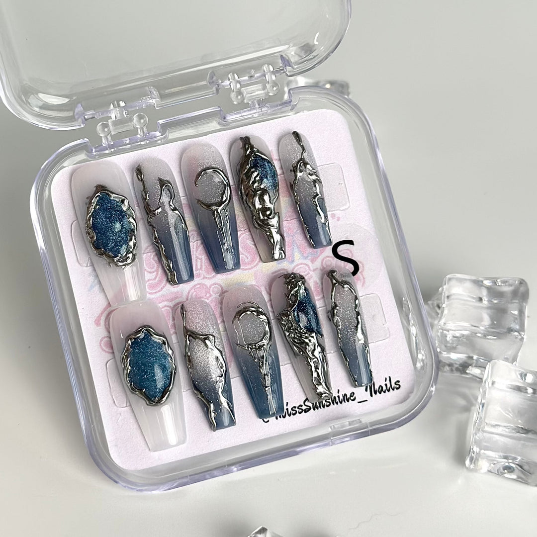 Space-themed nails in bold futuristic style