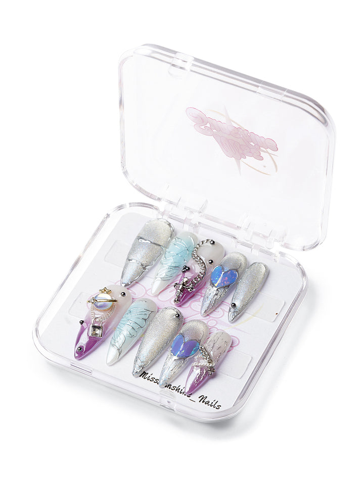 Long stiletto nails with wings