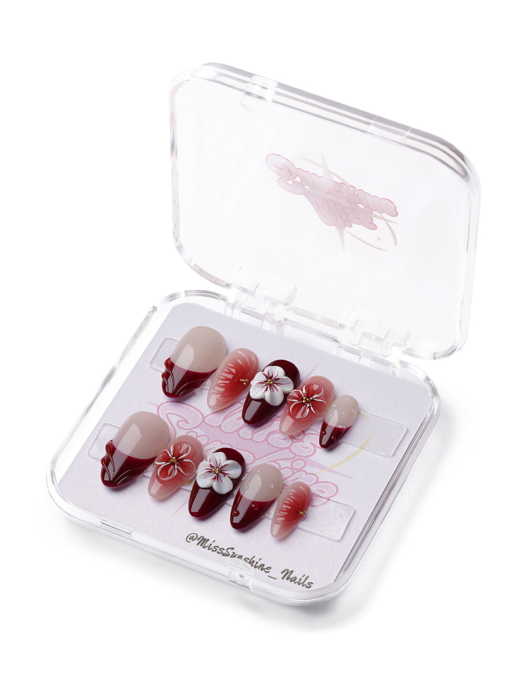 Wine Blossom short almond press-on nails with burgundy tips, 3D flowers, and romantic jelly accents.