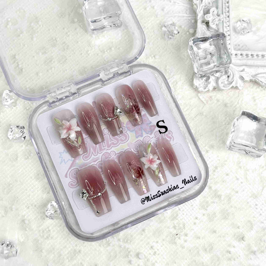 Medium coffin nails featuring glitter roses