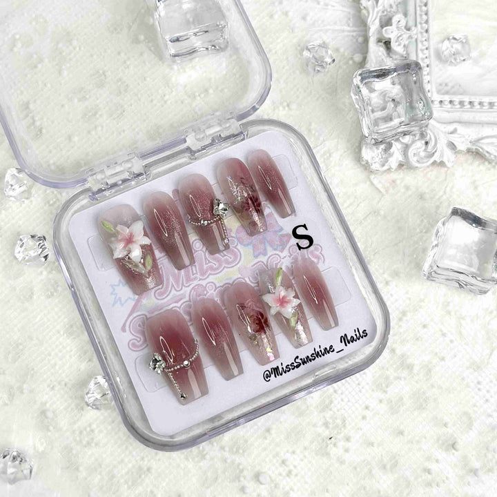 Medium coffin nails featuring glitter roses