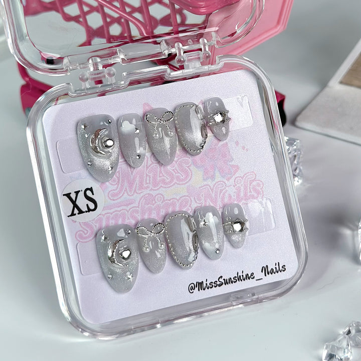 Oval nails with silver shimmer