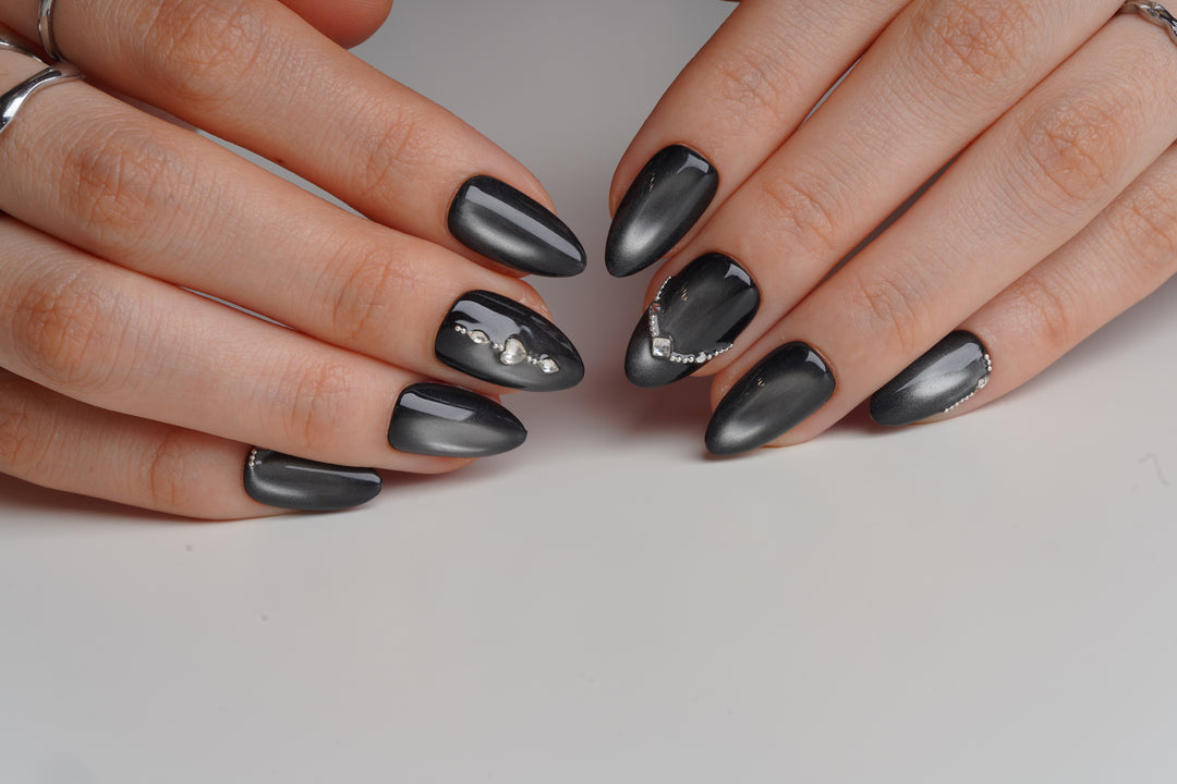 Black magnetic shimmer graduation nails with silver crystals