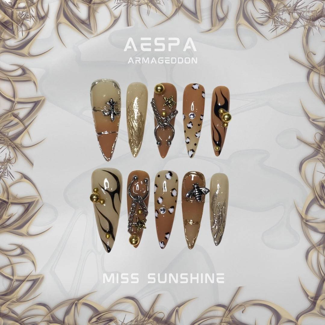 Gold bead glam nails with bold shapes