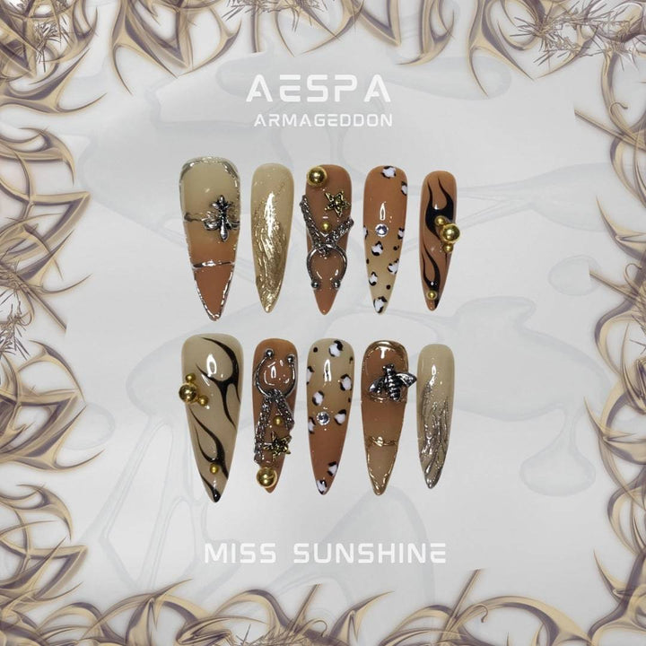 Gold bead glam nails with bold shapes