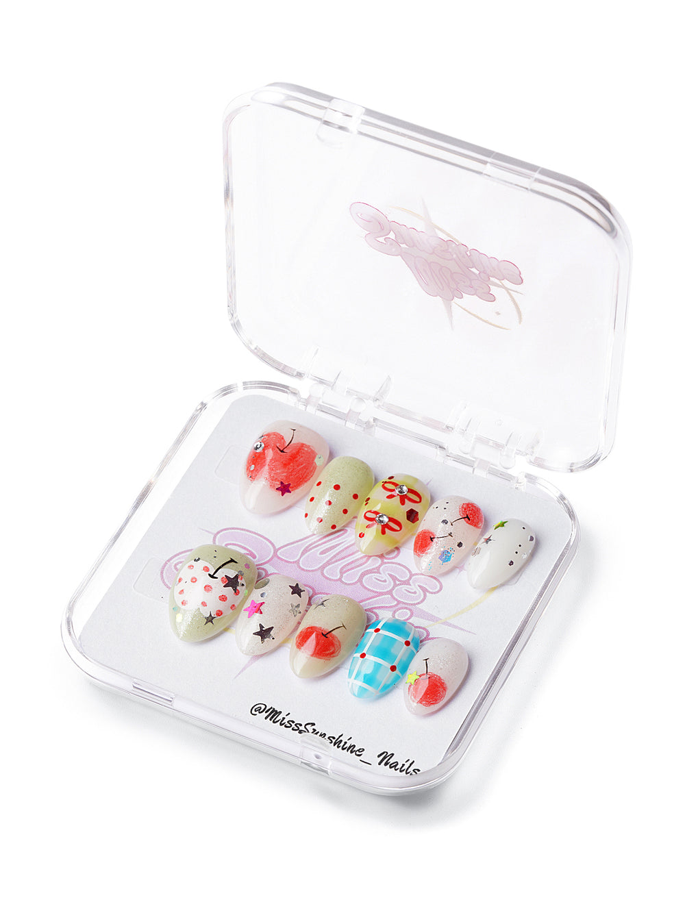 Extra short almond press-on nails with apples, stars, glitter, and colorful checkered and polka dot patterns