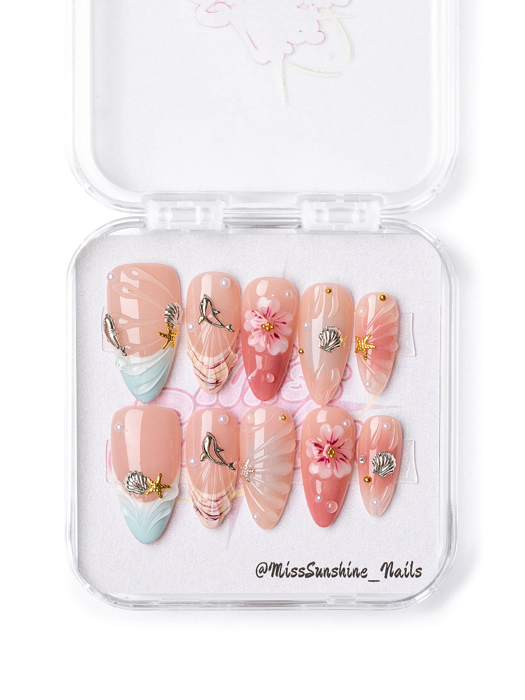 Medium almond beach-inspired press-on nails featuring tropical florals and pearl details