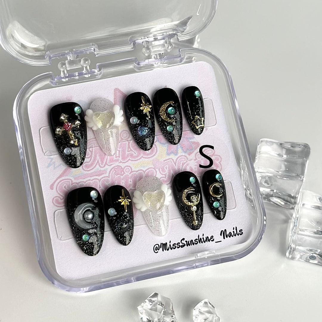 Black Sailor Moon inspired press-on nails in short almond shape
