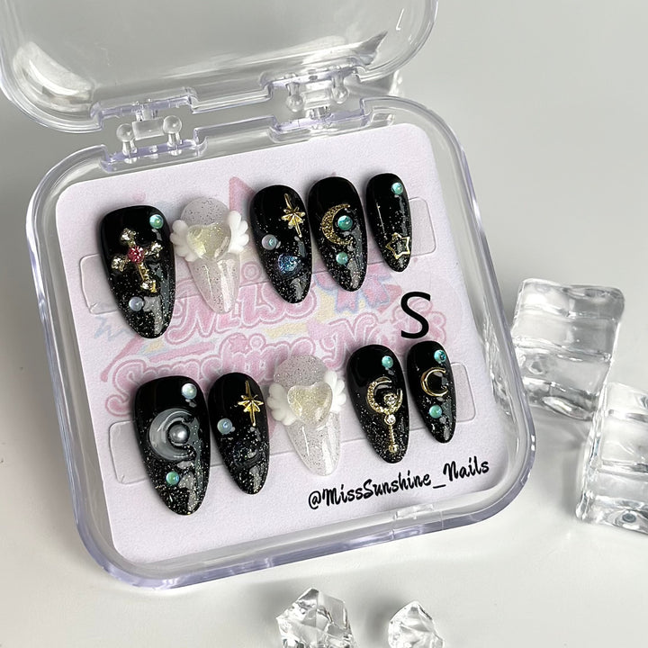 Black Sailor Moon inspired press-on nails in short almond shape