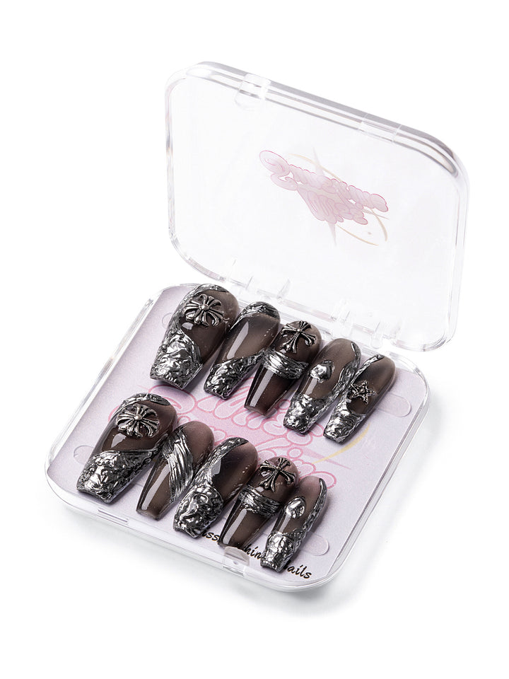 Long coffin press-on nails with black base and silver chrome accents