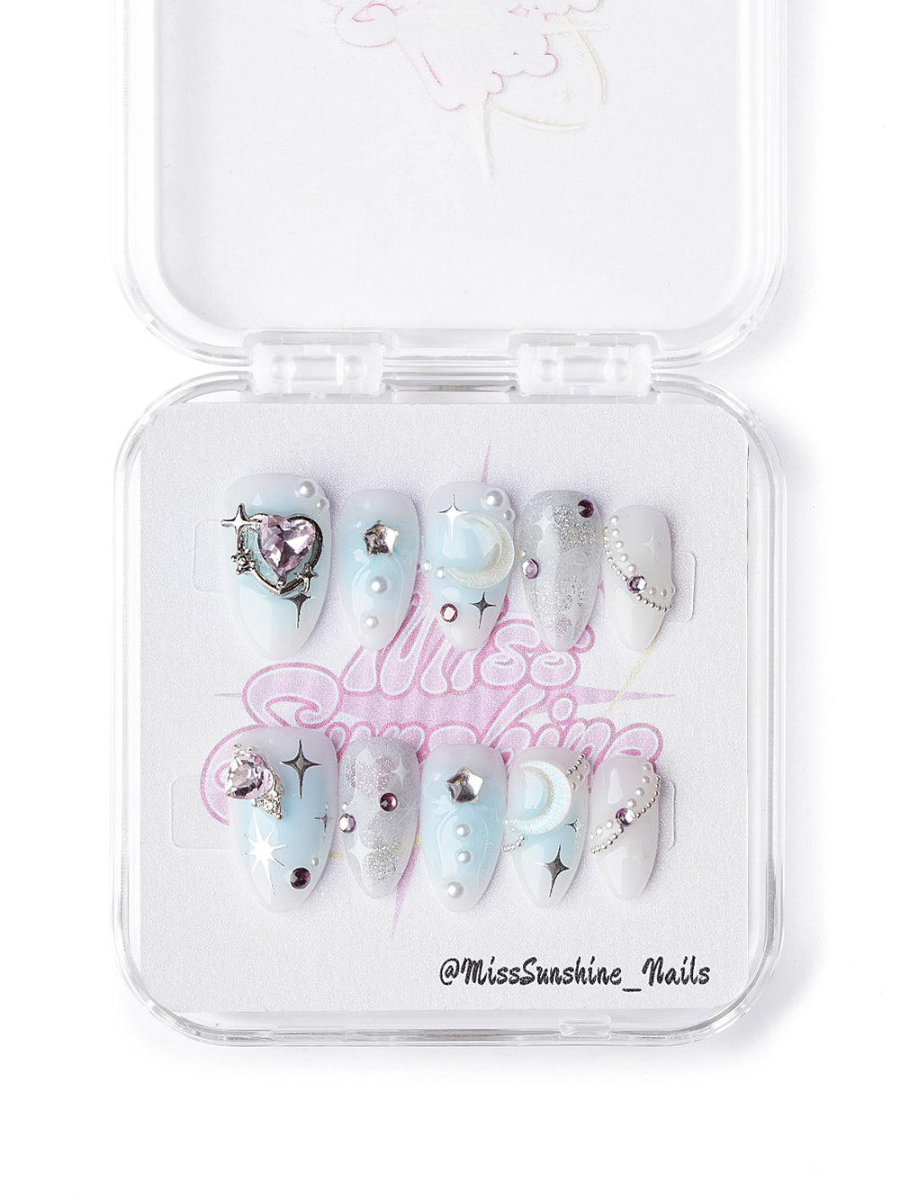 Celestial extra short press-on nails featuring blue gradients, silver glitter, and gemstone details