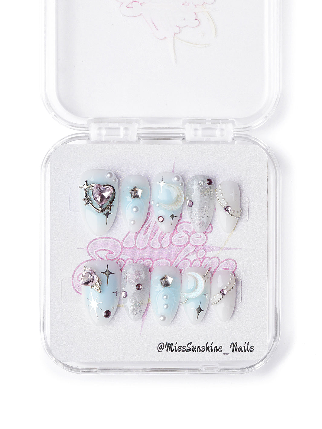 Celestial extra short press-on nails featuring blue gradients, silver glitter, and gemstone details