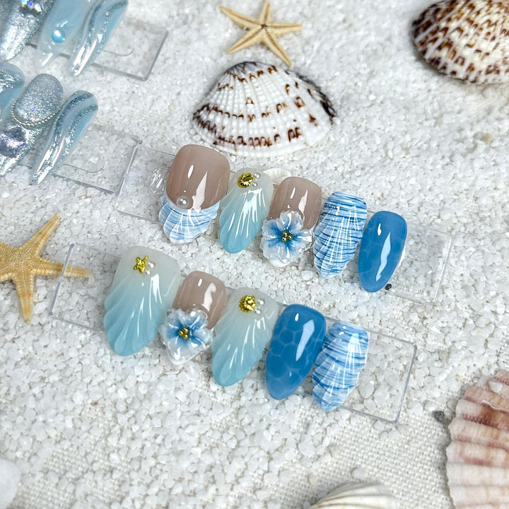 Iridescent beach-inspired nails with shimmer finish