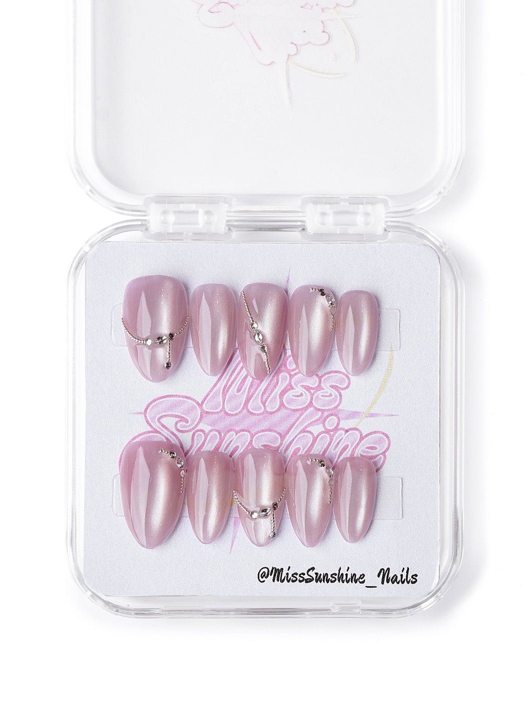 Handmade rosé press-on nails with pearlescent base, chain drapes, and mini studs