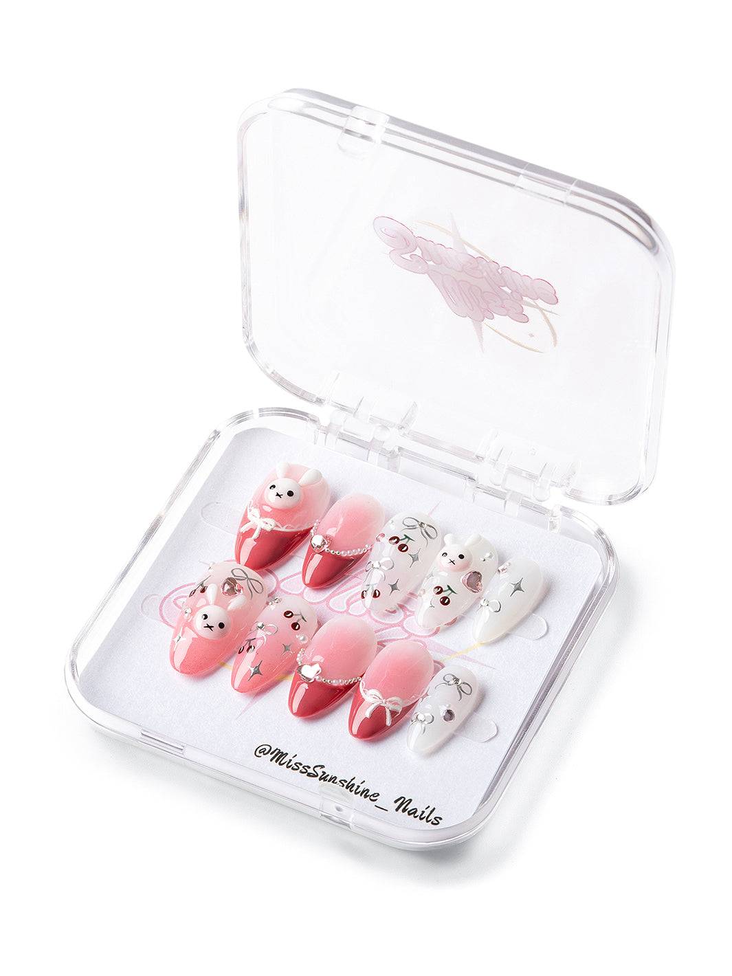Blushing bunny press-on nails with red ombré and cute charms