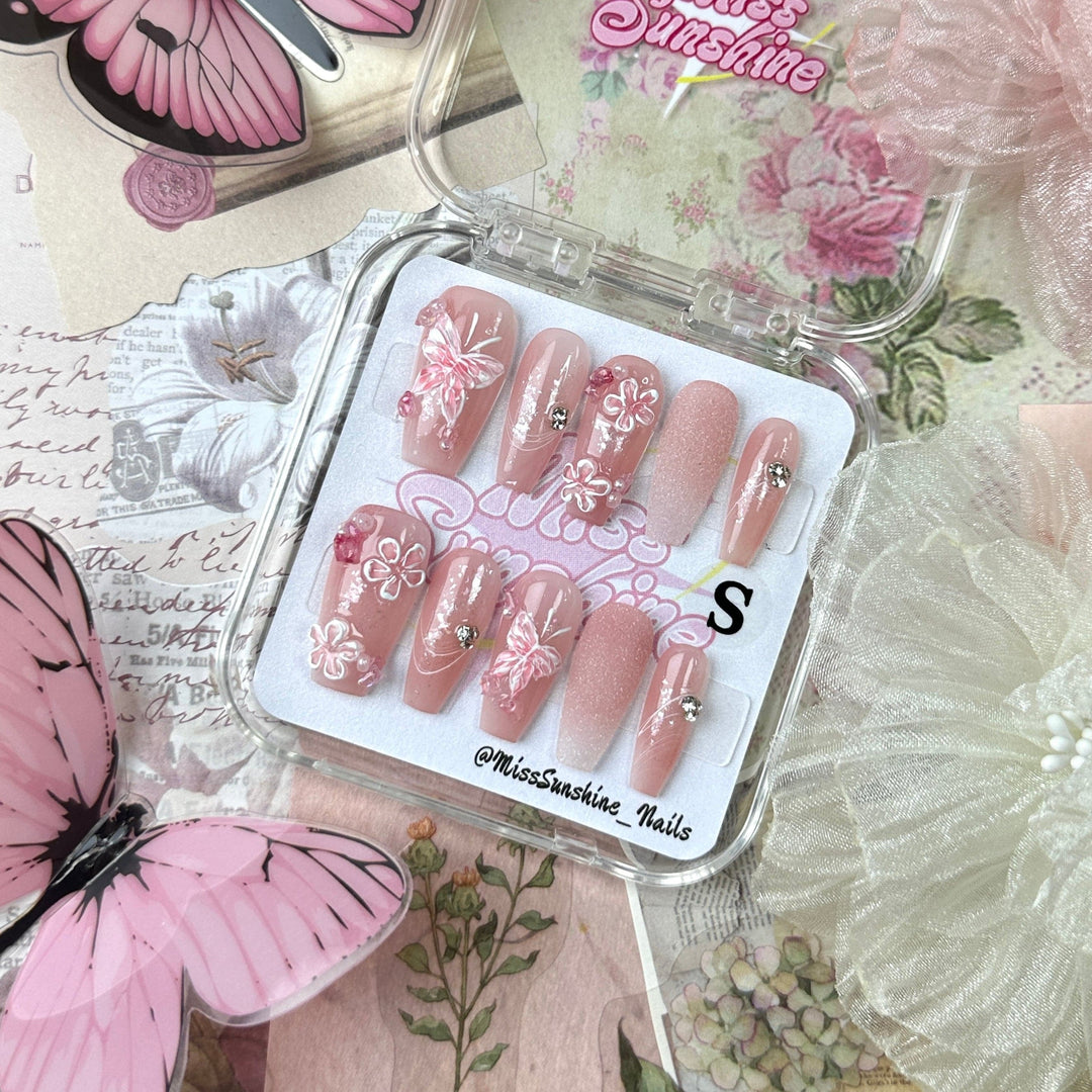 Butterfly Love press-on nails in medium long coffin shape