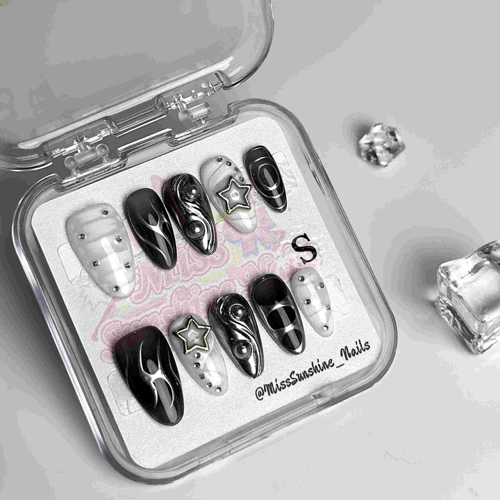 3D abstract nail art with metallic galactic designs