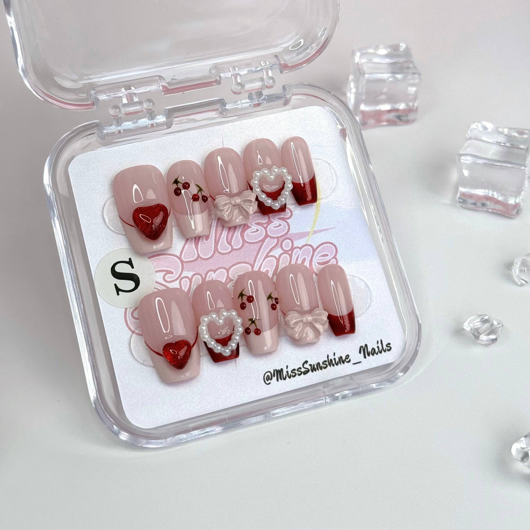 Short coffin nails with cherry and heart designs