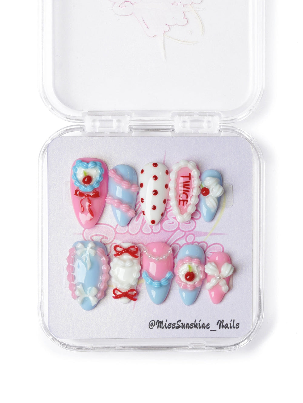 Cute kawaii cherry bow press-on nails inspired by K-pop aesthetics