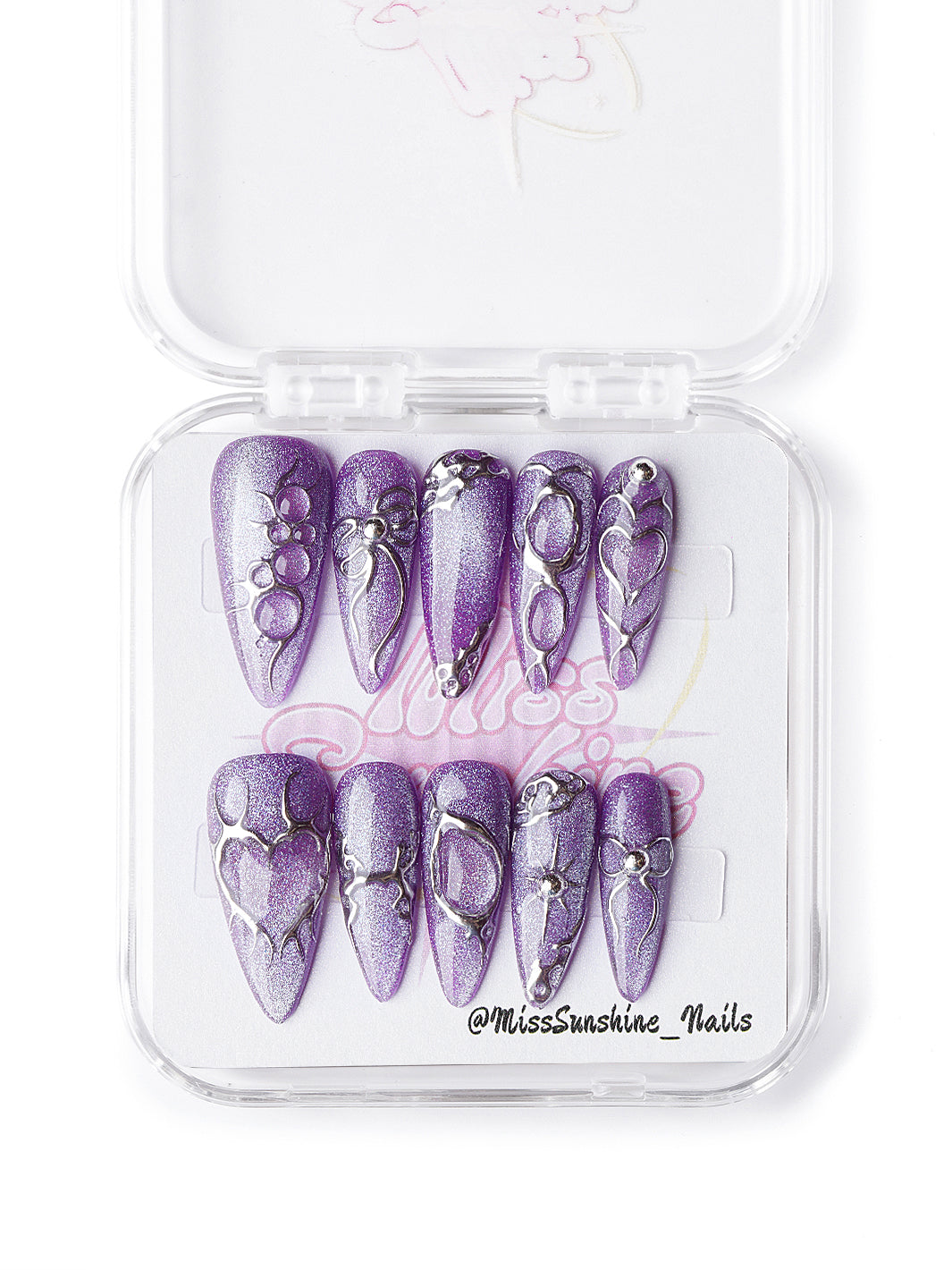 Gothic purple Halloween nails with sculptural silver details