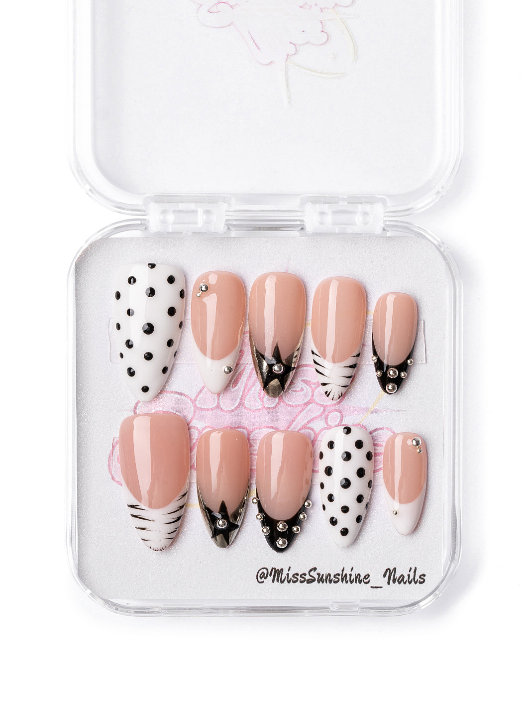 City Chic press-on nails featuring black and white accents with crystal details