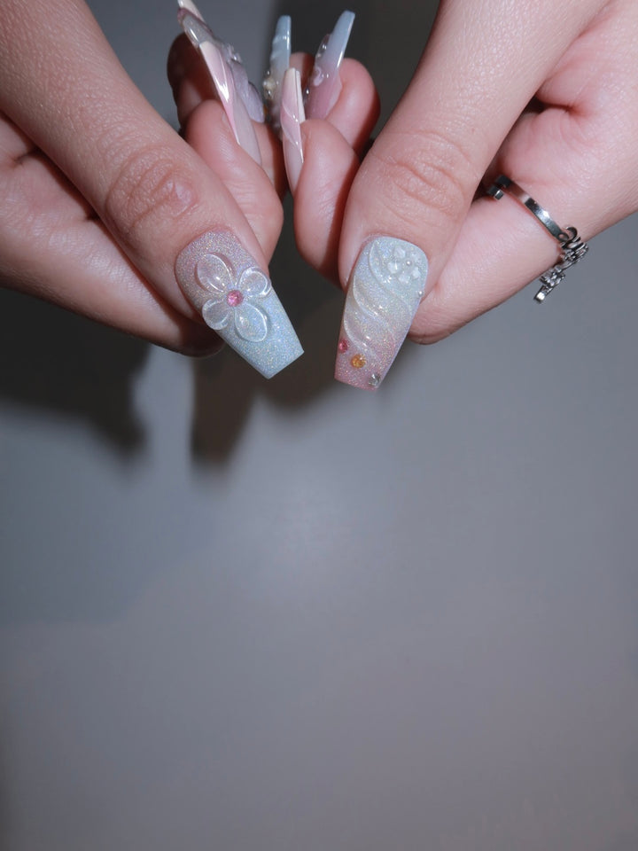 Handmade floral shimmer nail art