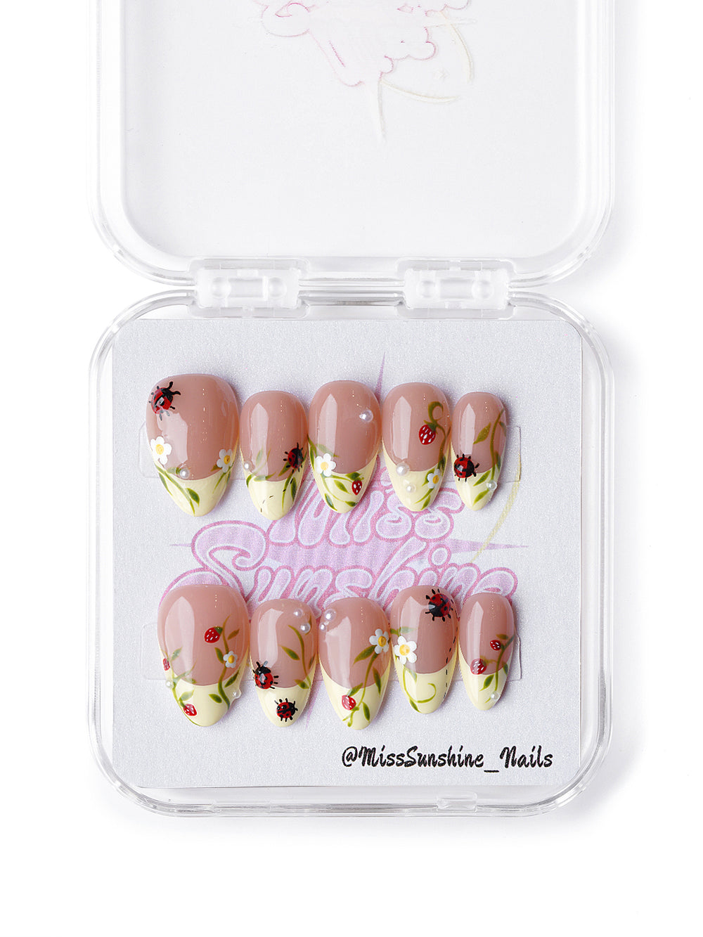 Handmade nude press on nails with garden-inspired 3D floral and insect details