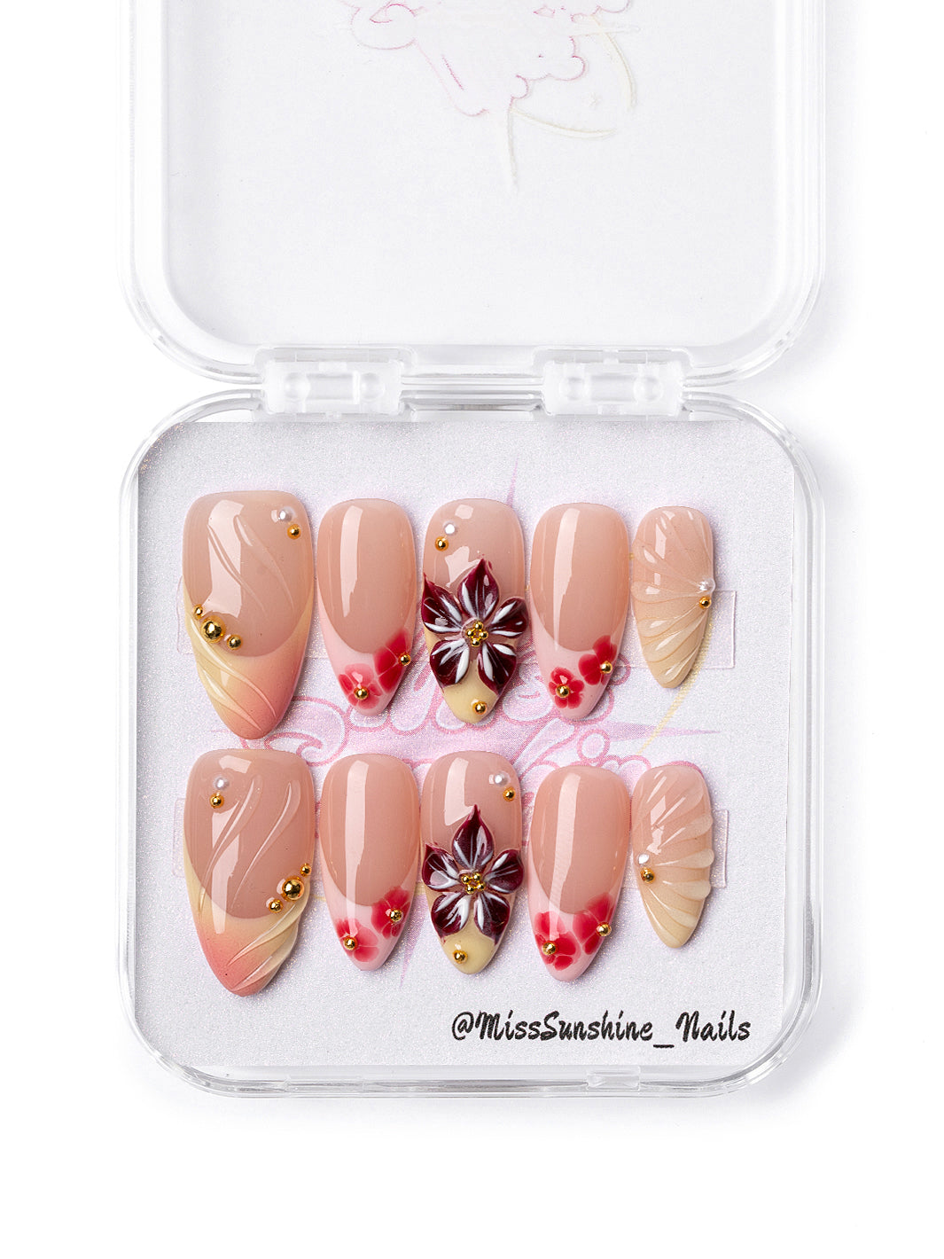 Crimson Plumeria medium almond press-on nails with deep red tropical flowers and gold accents
