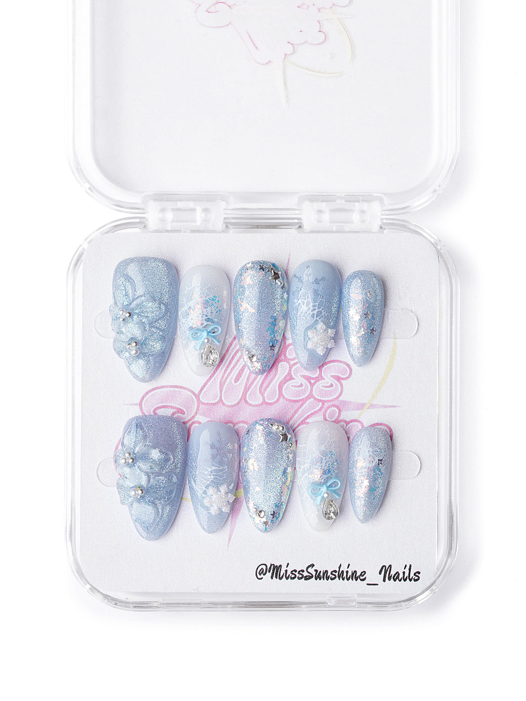 Winter floral short press-on nails with blue glitter, snowflakes, and gemstone detailing