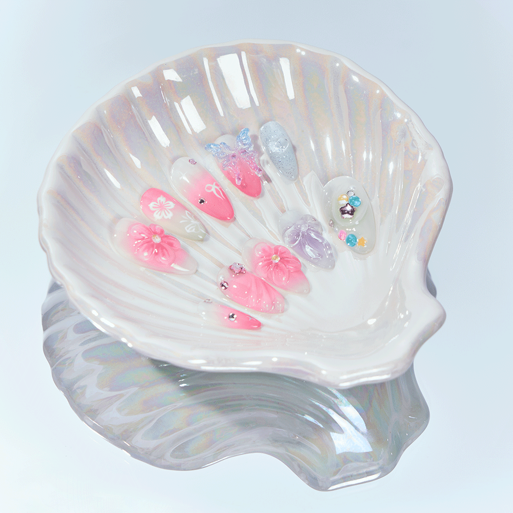 Butterfly charm and star accent nail designs