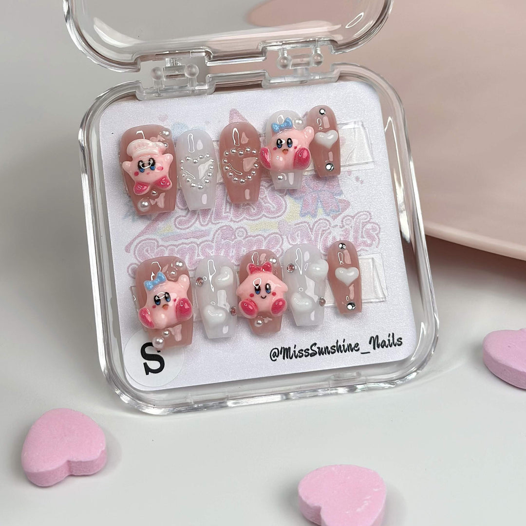 Short coffin nails with 3D Kirby characters and pearls